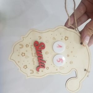 Wooden hanger shaped like a lovely Santa Claus